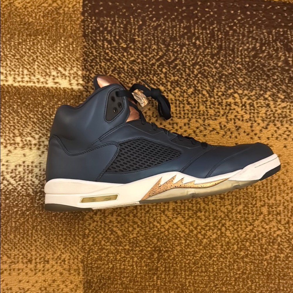 Jordan Blue and Gold Sneakers with Iconic Design